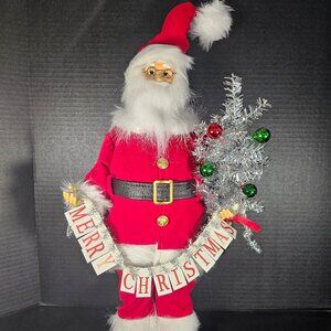 21" Tall Standing Santa With Merry Christmas Banner And Silver Decorated Tree